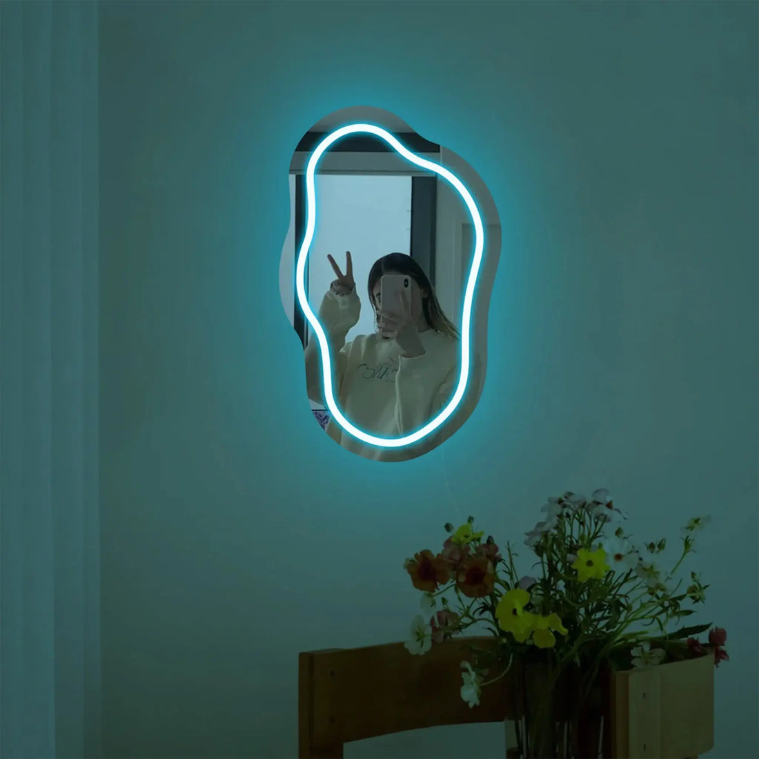 Front view of the Aurora Glow Mirror with vibrant neon hues.
