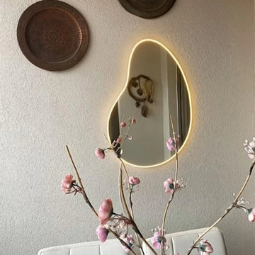 Front view of the Celestial Neon Mirror with soft glowing accents.
