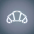 Croissant Neon Sign lit up in soft, inviting neon lights, perfect for kitchens, cafes, or bakeries.