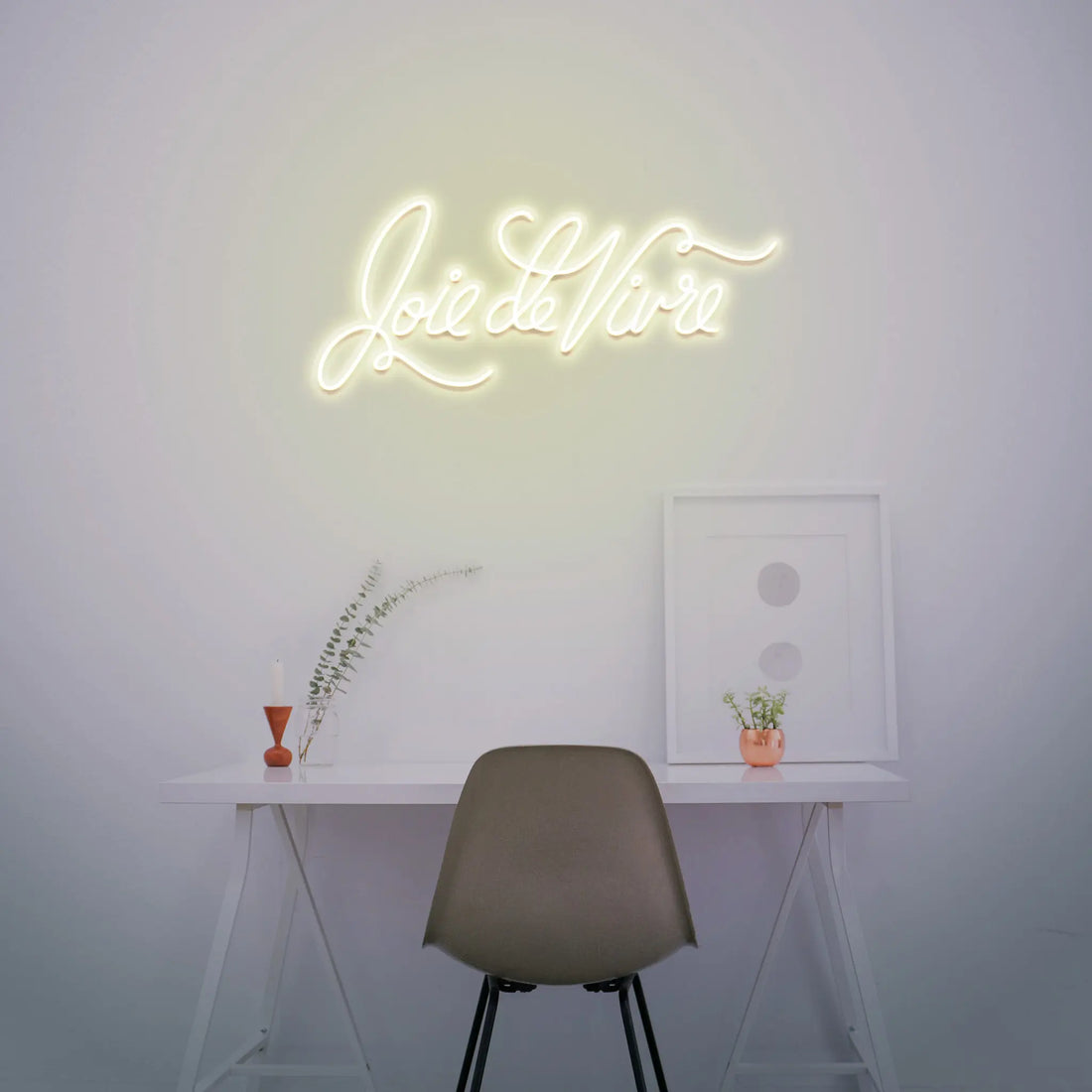 Joie de Vivre Neon Light lit up in bright, joyful colors, adding energy and positivity to any room.