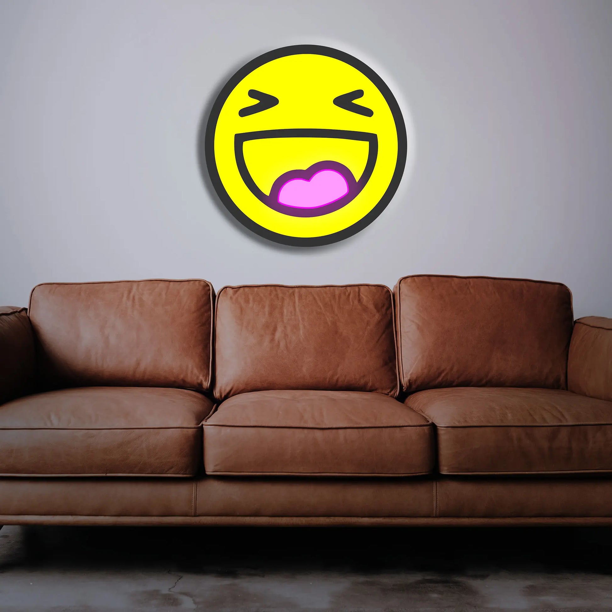 "Close-up of Laughing Emoji Neon Sign with bold, cheerful colors."