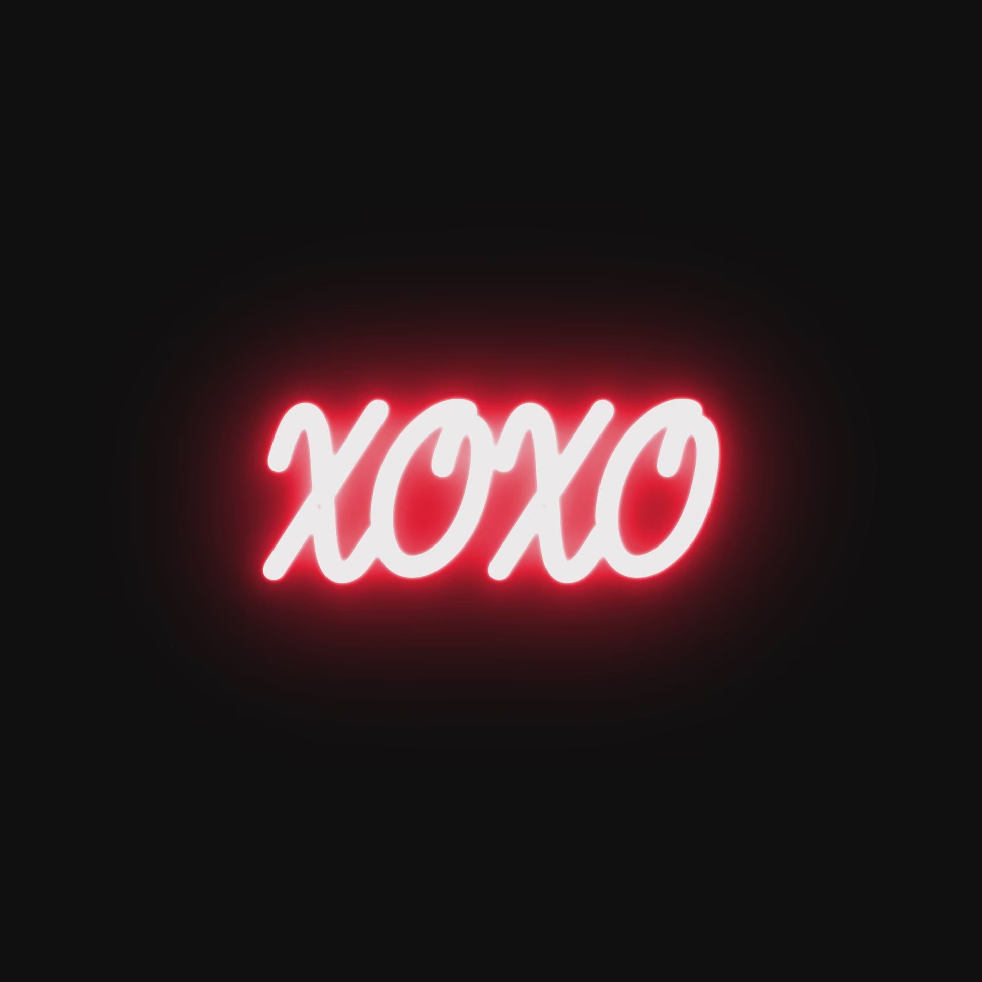 Watch the XOXO neon sign illuminate in vibrant colors, enhancing the mood of any room with its bold and romantic glow.