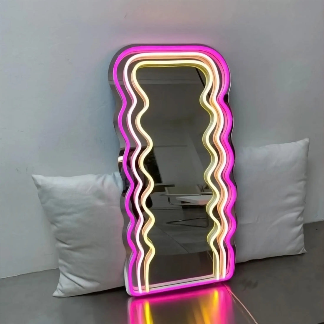 Front view of the Wavy Neon Mirror with glowing neon highlights.
