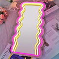 Wavy Neon Mirror enhancing living room decor with vibrant light.
