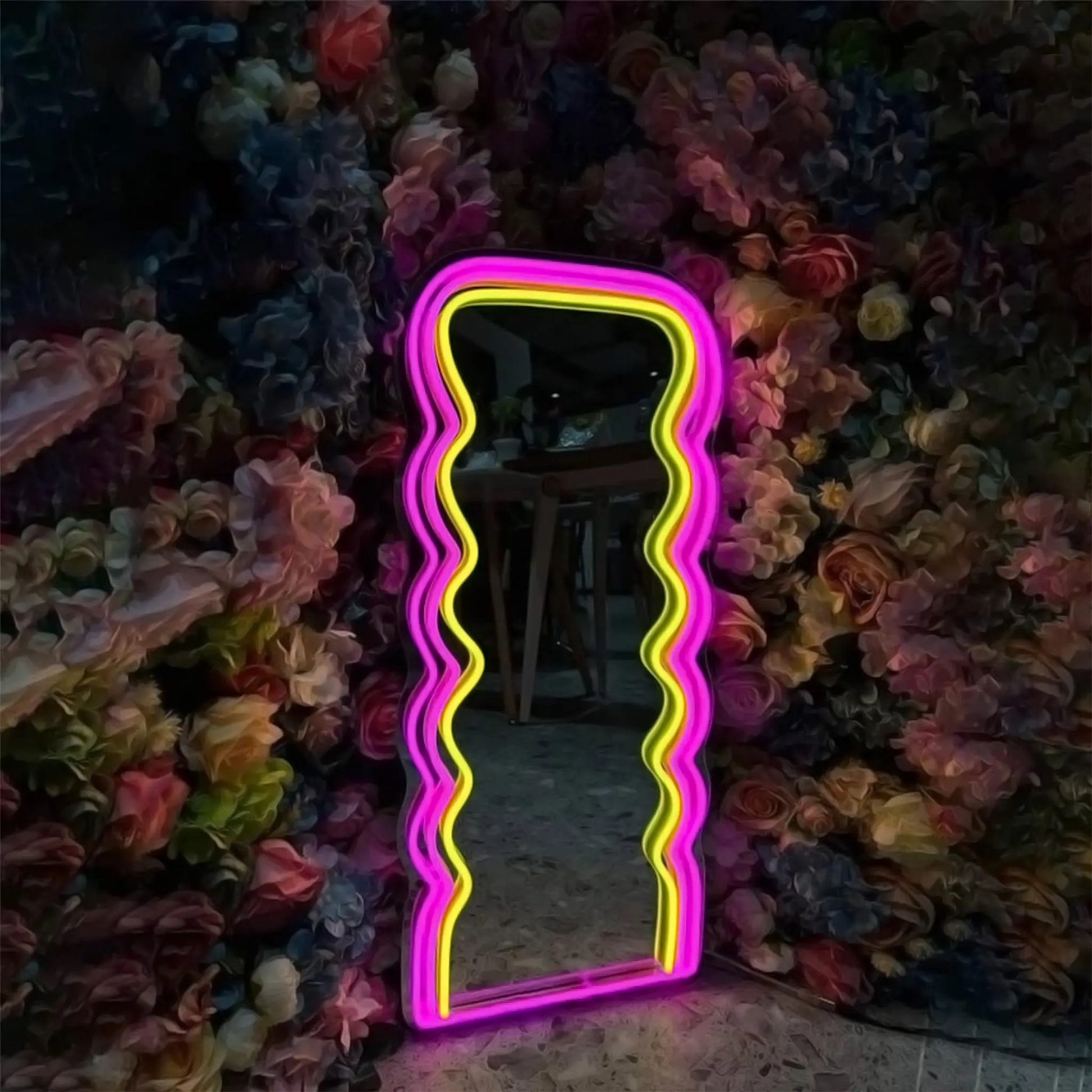 Wall-mounted Wavy Neon Mirror adding a stylish touch to any space.
